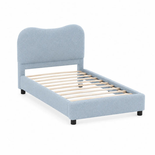 Cama individual de tela con cabecero curvado azul claro